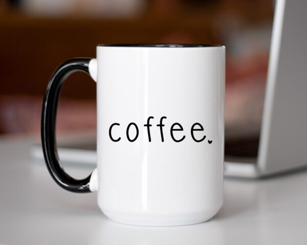 A coffee mug sitting on top of a table.