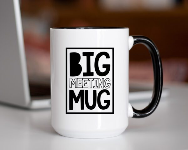 A coffee mug with the words " big meeting mug ".