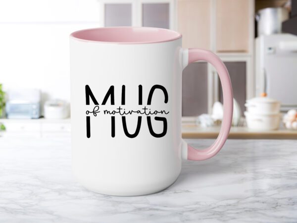 A pink coffee mug sitting on top of a counter.