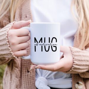 A person holding a mug with the words " mug ".