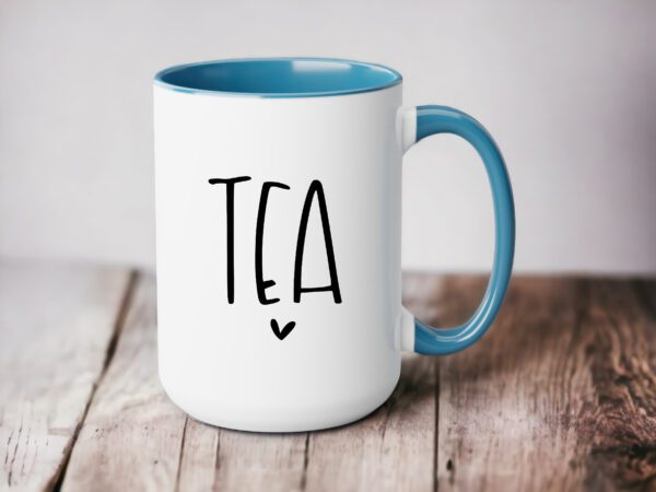 A coffee mug with the word tea written on it.