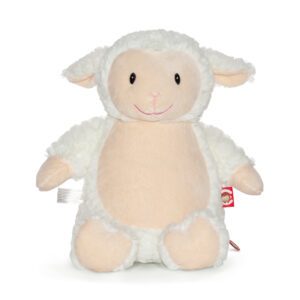 A stuffed animal lamb is sitting on the floor.