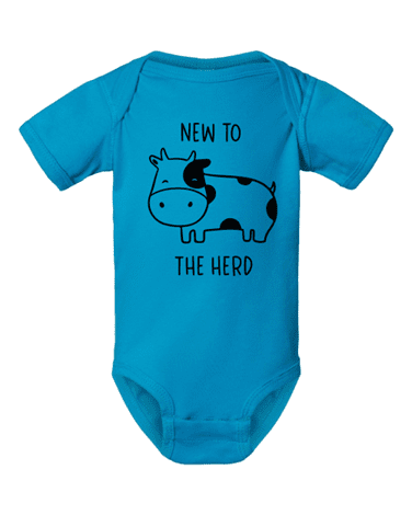 A blue onesie with an image of a cow.