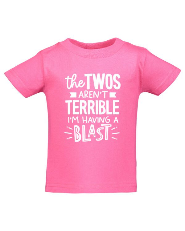 A pink t-shirt with the words " the twos aren 't terrible i 'm having a blast ".